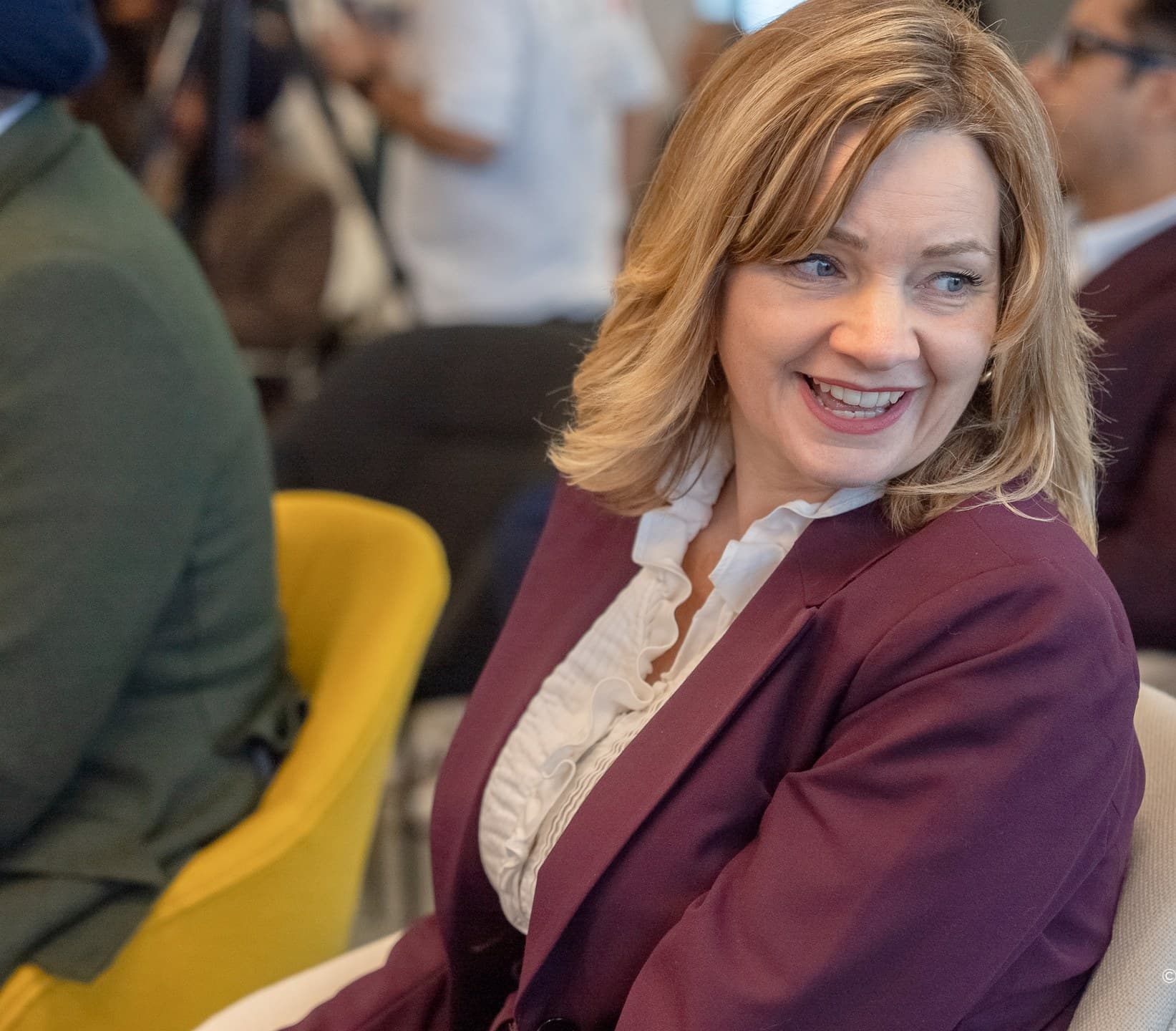 A smiling participant at Kickoff Day