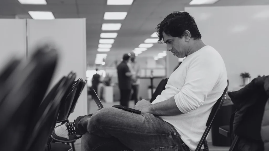 founder reading an article about cyber security